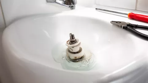 korek do umywalki klik klak jak naprawić